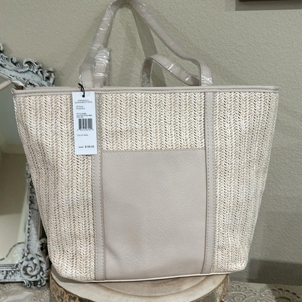NWT French Connection straw double handle tote bag. Color wheat. Price firm